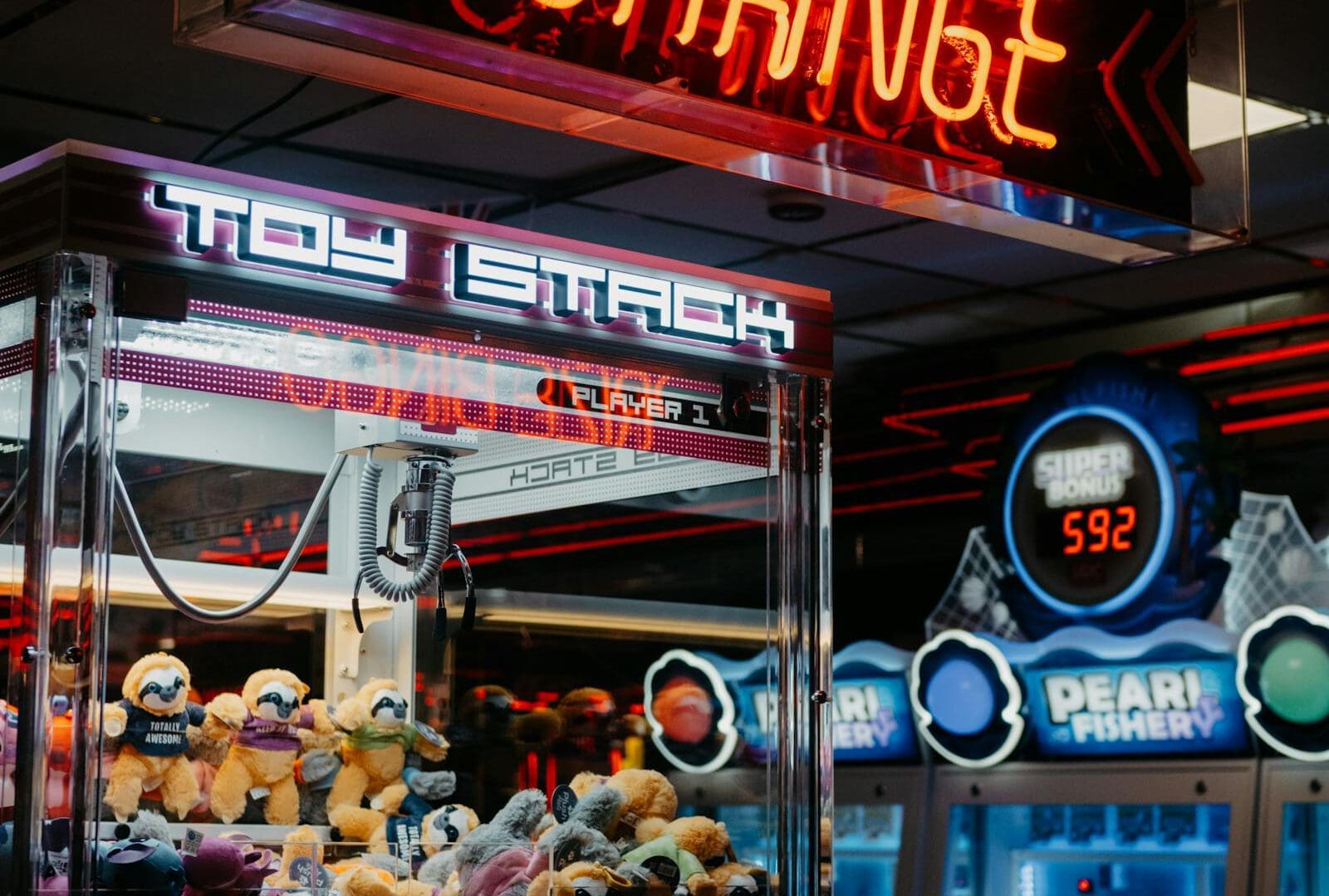 Best Arcades & Interactive Entertainment in San Antonio (2026) featured image: neon arcade machines