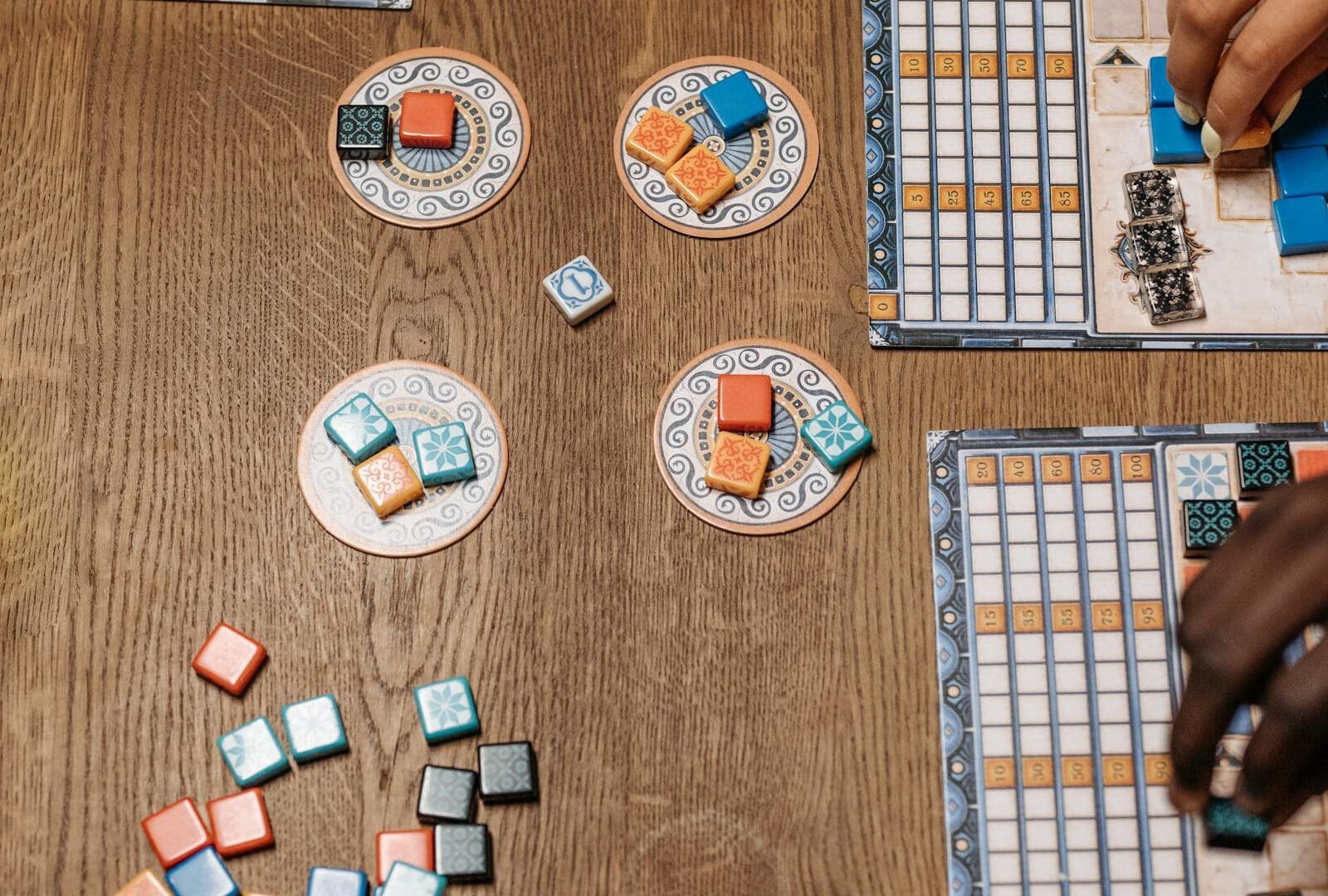 Dice Drop Tavern in San Antonio: Late-Night D&D and Drinks Guide: group playing board game together for Dice Drop Tavern D&D guide