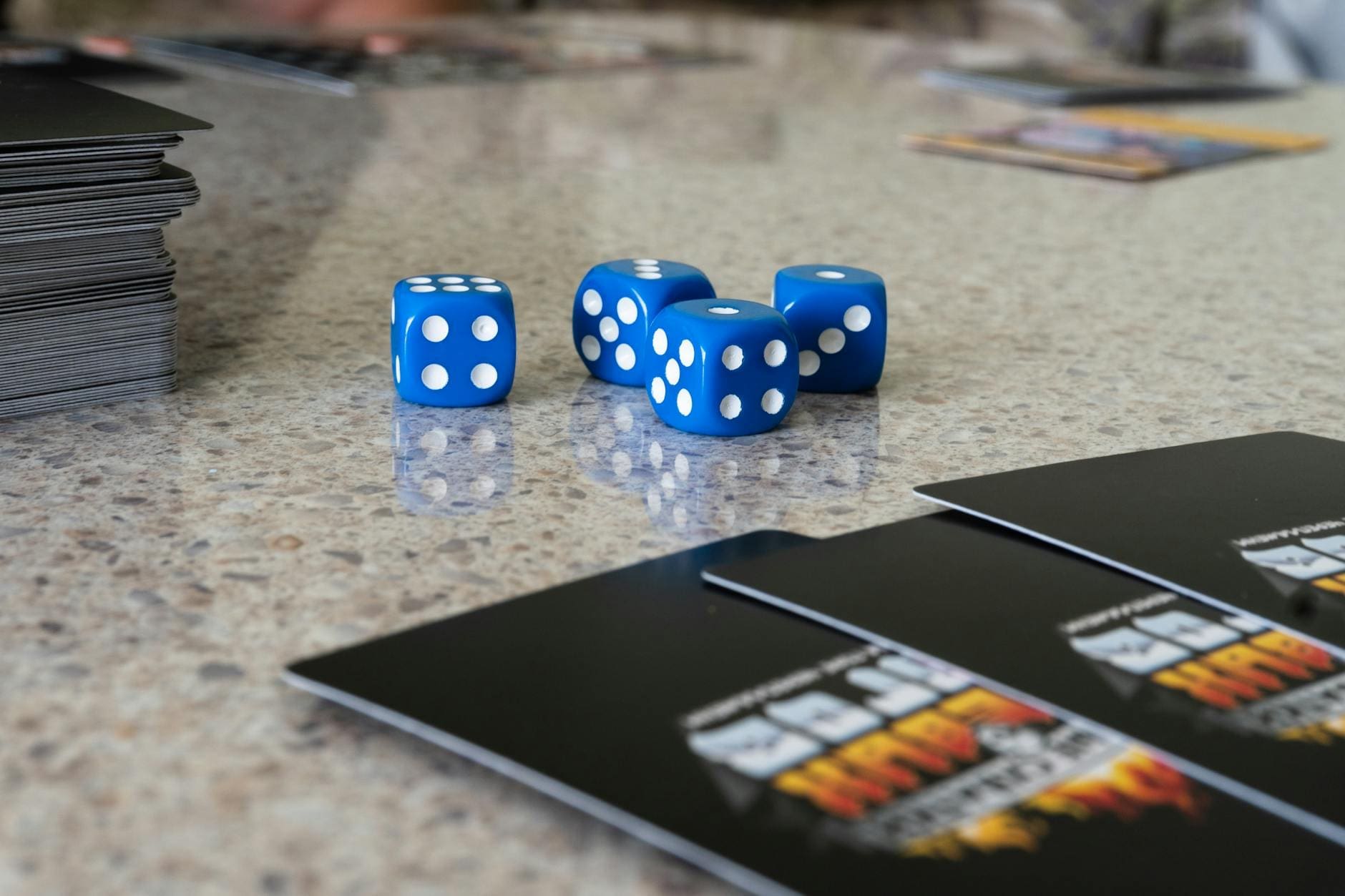 Friends gathered around a table for tabletop game night