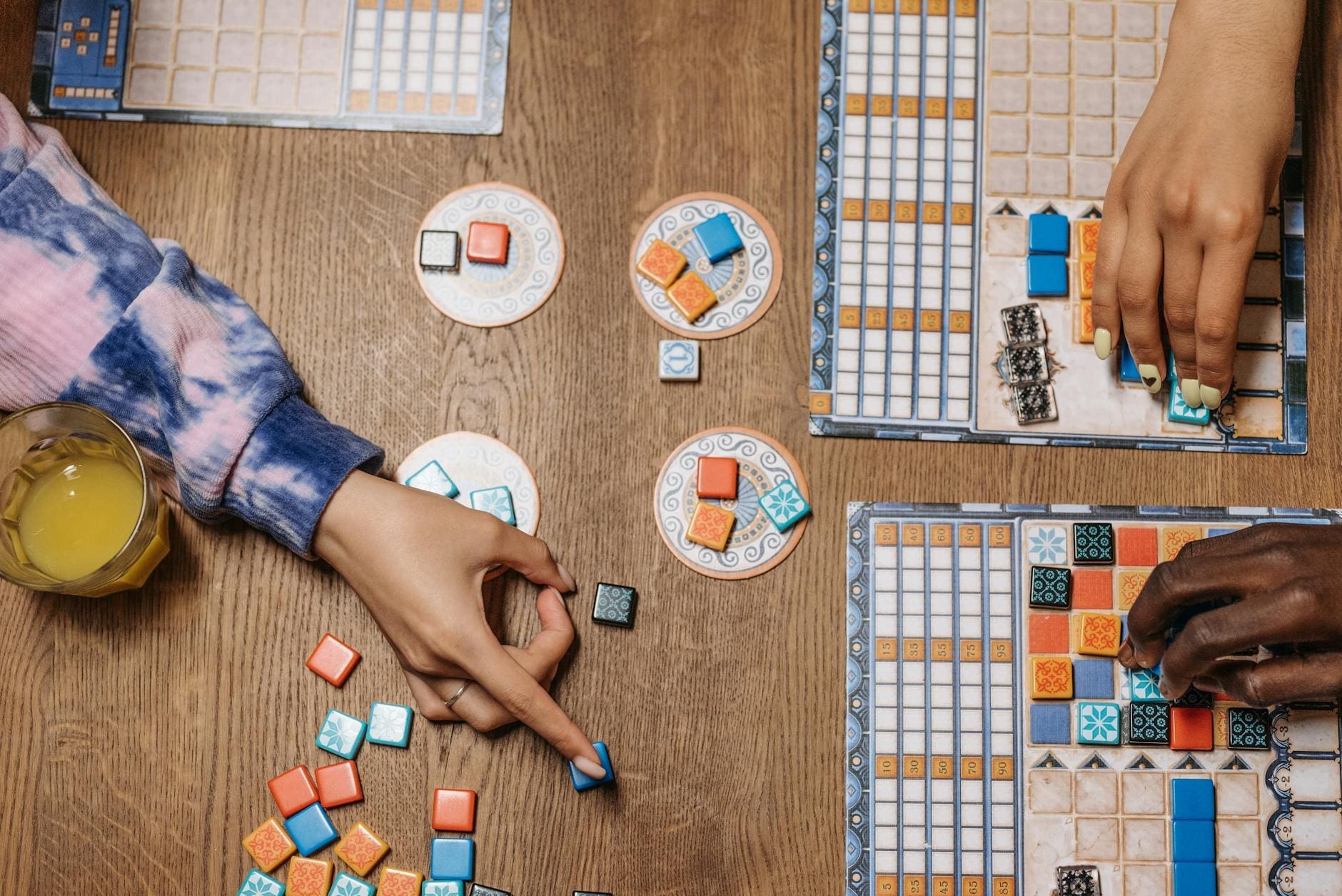 Friends playing board games at a cafe