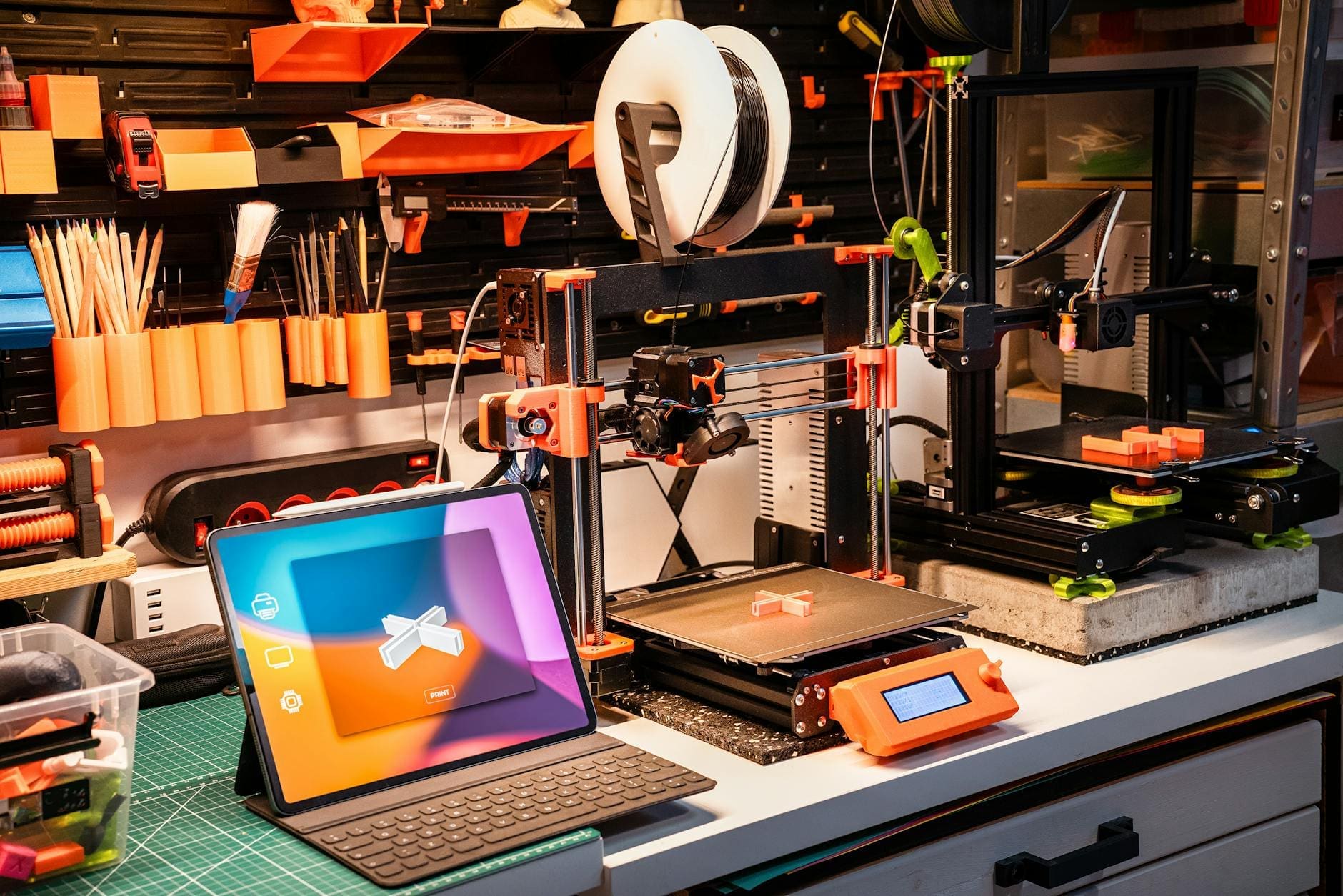 Person working in a maker space with 3D printer