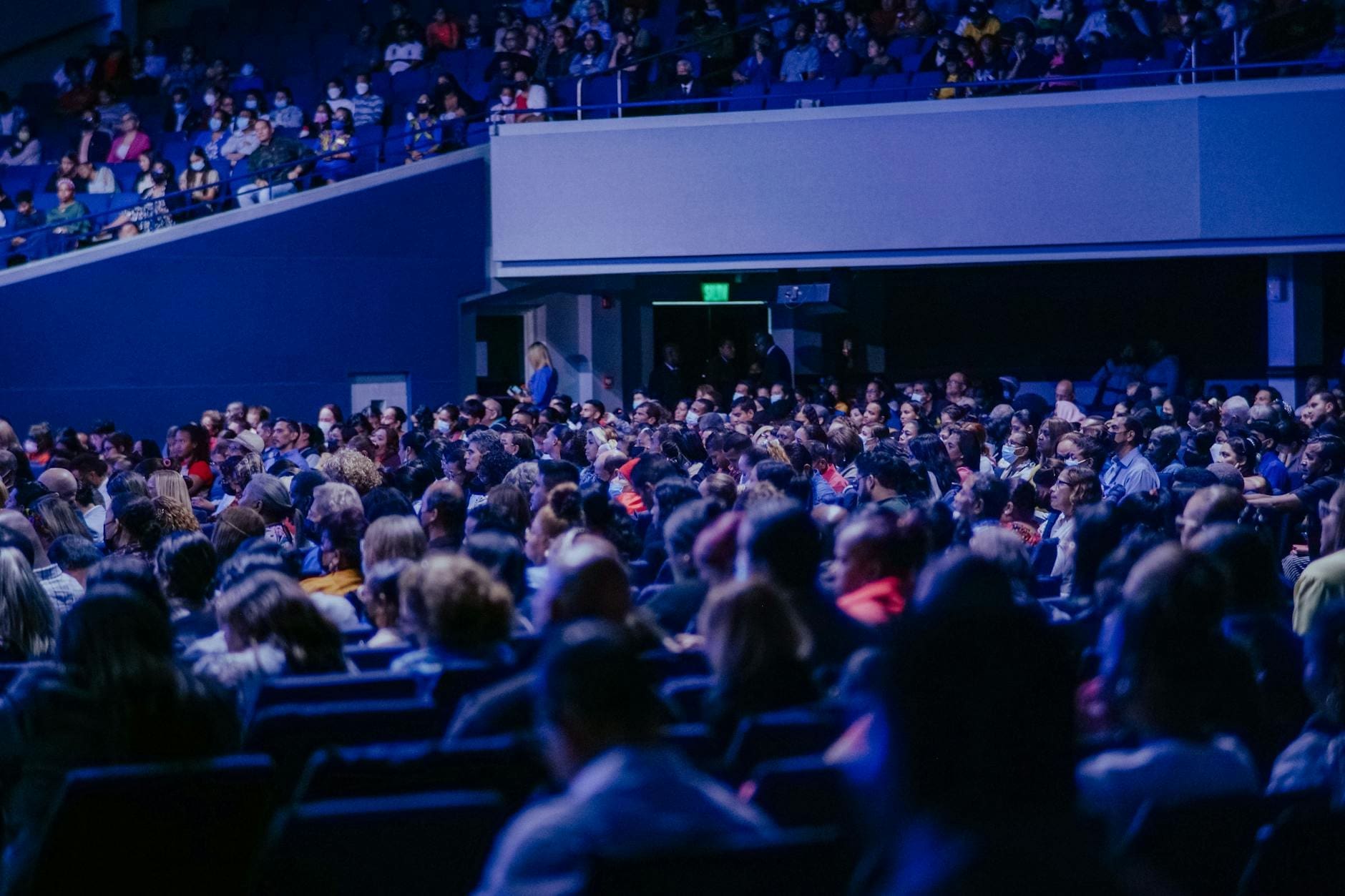 Large convention hall filled with attendees